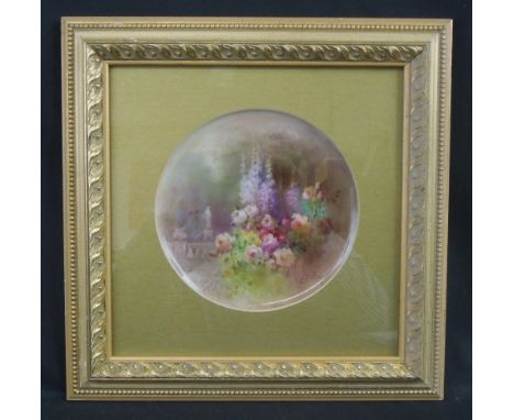 EDWARD J. RABY, (British, 1863-1940), flowers in a garden, signed, oils on ceramic dish, now mounted as picture.  16cm diamet