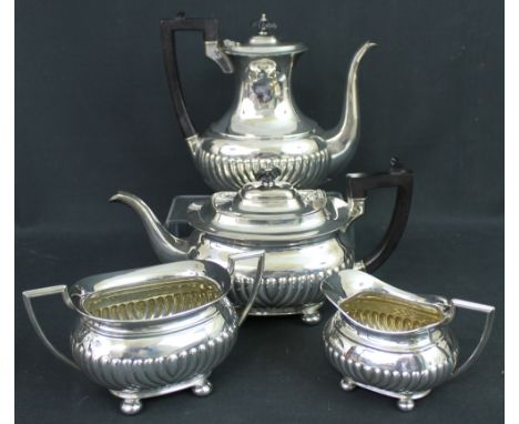 MATCHED LATE 19TH/EARLY 20TH CENTURY FOUR PIECE SILVER TEA AND COFFEE SET, comprising: teapot; coffee pot; two handled sucrie