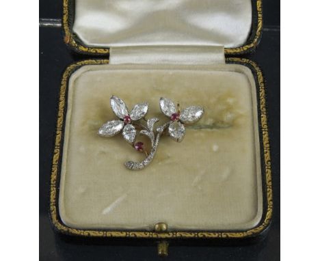 20TH CENTURY YELLOW METAL SET, DOUBLE FLOWER HEAD PIN BROOCH set with marquise cut diamonds with ruby centres and points, 3cm