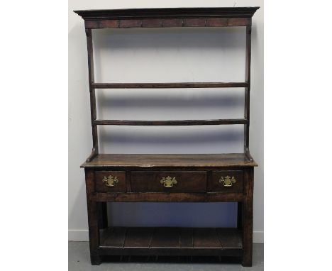 SMALL 18TH CENTURY STYLE WELSH OAK DRESSER, having open two shelf rack back with iron hooks and moulded cornice, the base wit