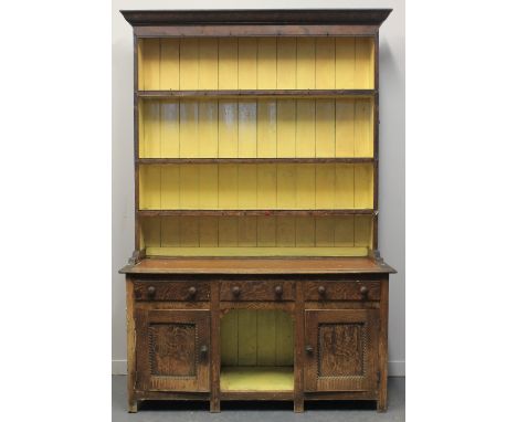 19TH CENTURY PEMBROKESHIRE GRAINED PINE DOG KENNEL DRESSER, having moulded cornice over three shelf boarded rack back, the ba