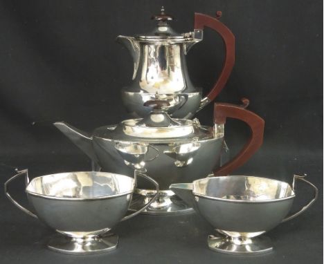 MID 20TH CENTURY SILVER FOUR PIECE TEA SET, comprising: teapot; water jug; cream jug and sucrier, of oval form.  Birmingham, 