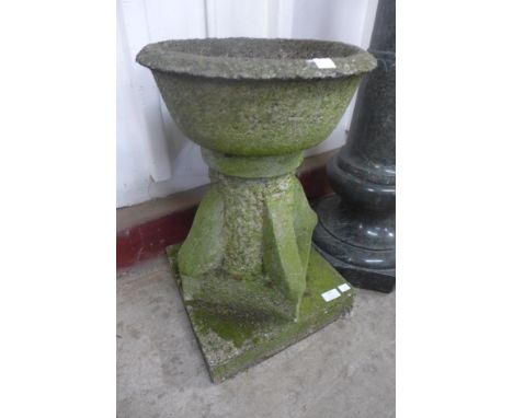 An Arts and Crafts style concrete planter 