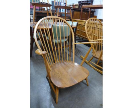 An Ercol Blonde elm and beech Windsor armchair 