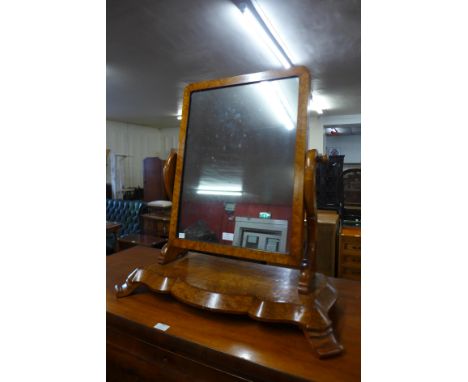 A Victorian birds eye maple toilet mirror 