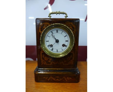 A 19th Century French inlaid rosewood mantel clock, movement signed Louis et Miera, Paris 