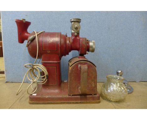 A vintage Crypto red metal coffee grinder 