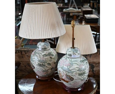 A pair of Chinese globular ceramic table lamps, 35 cm with telescopic brass stems