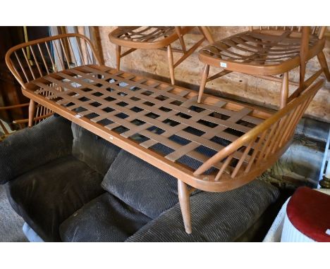 A 1960's/70's Ercol Windsor light elm and beech studio couch/daybed frame, model 355, with removable back, webbed base and sp