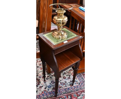 A mahogany lamp table with gilt tooled leather top to/w a brass oil lamp converted for electricity (2)