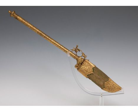Bhuj Dagger: Kutch-Gujarat, India, 19th century.Steel inlaid with silver and gold.It has a green velvet sheath.There are crac