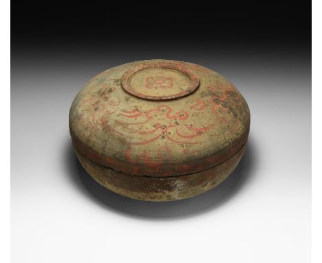 Han Dynasty, 206 BC-220 AD. A ceramic vessel comprising a hemispherical body with shallow everted foot and band of painted de