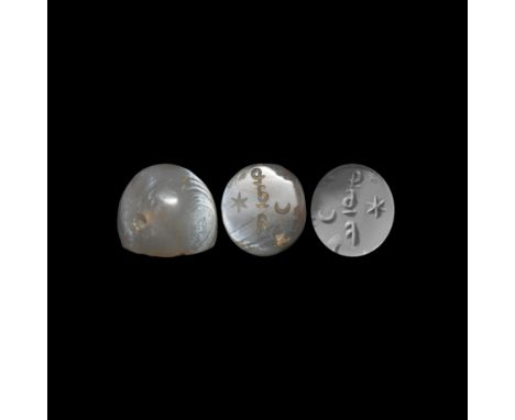 3rd-7th century AD. A banded agate seal with Pahlavi inscription between a six-pointed star and a crescent; accompanied by a 