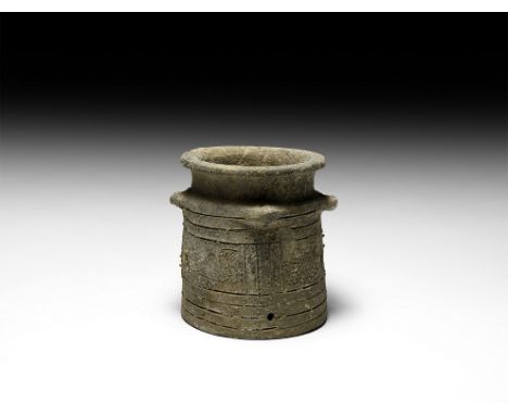 Middle Bronze Age, mid 3rd-mid 2nd millennium BC. A ceramic jar comprising a slightly flared body, rounded rim, four pierced 