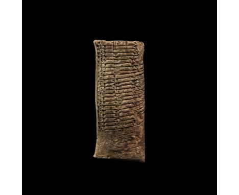 2000-1600 BC. A ceramic pillow-shaped tablet containing an impressed multiplication table for 18 to one face, accompanied by 