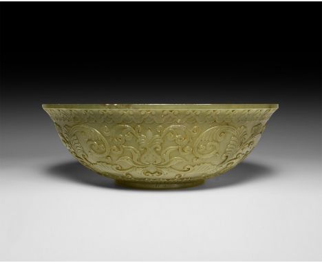 Qing Dynasty, 1616-1911 AD. A Mughal carved jade bowl with basal ring, band of radiating tongue-shaped panels to the undersid