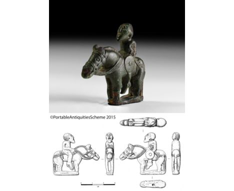 6th-7th century AD. A bronze warrior figurine, an armed rider sitting astride his horse on a small rectangular base; the male