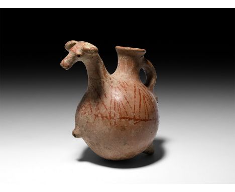 1st millennium BC. A ceramic zoomorphic vessel formed as a ram; exaggerated spherical body with conical legs, integral neck a