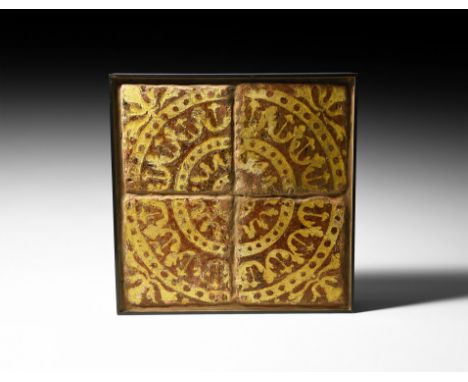 13th-14th century AD. A group of four glazed ceramic floor tiles from Northern France, re-set in more recent times: each tile