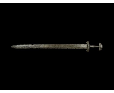 10th-early 11th century AD. An iron double-edged sword, variant of Petersen Type L, with tapering blade showing signs of empl