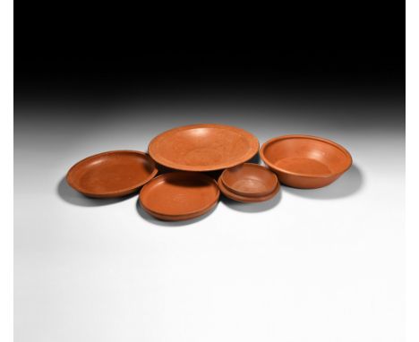 4th-5th century AD. A group of five redware ceramic bowls of Late Roman C-ware from Asia Minor, the smallest with carinated p