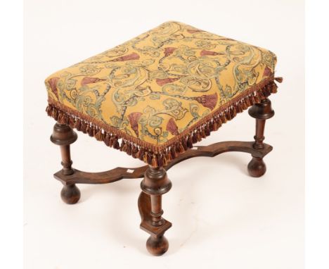 A William & Mary stool with upholstered top, on turned umbrella-type legs and flat stretcher, 62cm wide CONDITION REPORT: Con