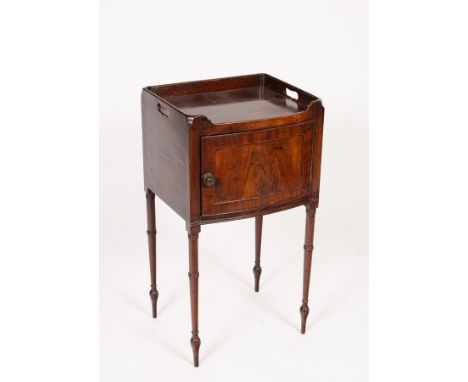 A mahogany tray top bedside cupboard, on turned tapering supports, 42cm wide x 76cm high x 33cm deep  CONDITION REPORT: All o