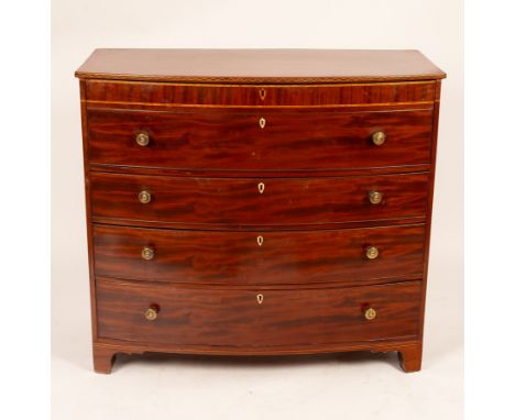 A Regency mahogany bowfront secretaire chest, with satinwood fitted interior, on bracket feet, 119cm wide CONDITION REPORT: C