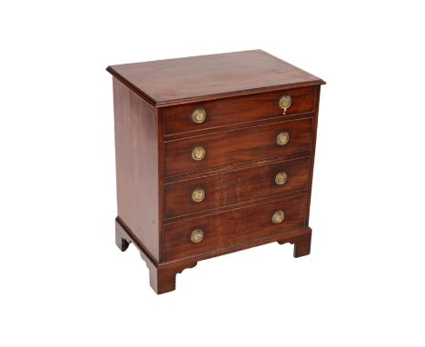 A mahogany commode, with false four drawer front on bracket feet, 69cm wide x 74cm high x 45.5cm deep
