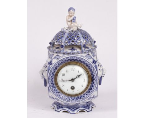 A Royal Copenhagen 'Blue Fluted Full Lace' porcelain mantel clock decorated with blue scale borders and leafy fronds, late 19