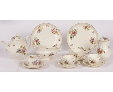 A Royal Worcester 'Roanoke' pattern part dinner and tea service, floral spray decorated to include two teapots, three jugs, n