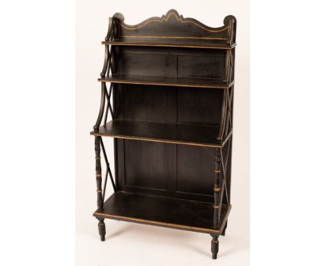 A Regency style ebonised waterfall bookcase, the shelves with X-shaped ends, 68cm wide x 120cm high x 32cm deep   CONDITION R