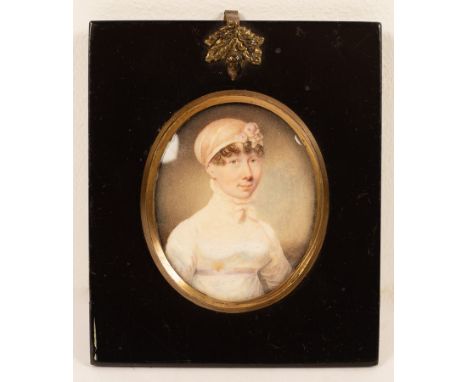English School, circa 1810/Portrait Miniature of a Young Woman/wearing a pink bonnet/watercolour on ivory, 7.3cm x 6cm/Ivory 