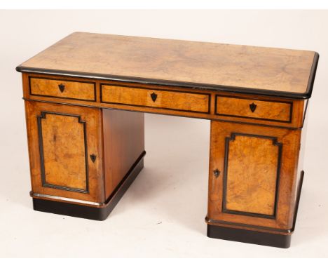 A Victorian walnut and inlaid pedestal desk, fitted three drawers above two cupboards, 137cm wide x 77cm high x 72cm deep   C