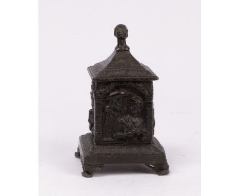 A Dutch lead tobacco jar, head finial, square shape with figures in relied, on a square base and four feet, approximately 23c