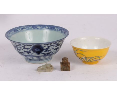 A Chinese soapstone seal, a jadeite netsuke and two 20th Century Chinese bowls (4) CONDITION REPORT: Condition information is