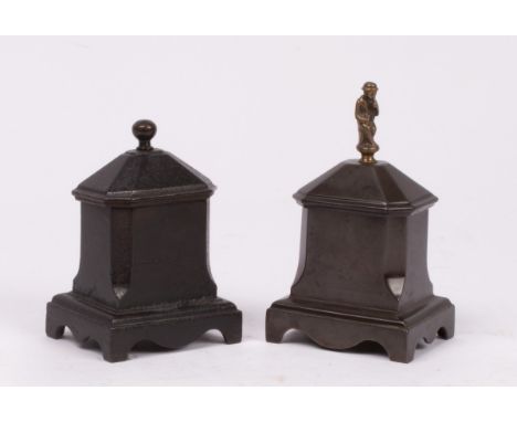 Two Regency cast iron tobacco boxes, one with figural finial, approximately 18cm and 15cm high  CONDITION REPORT: Condition i