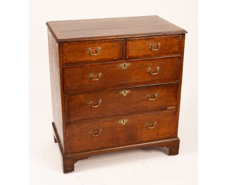 A Georgian oak and elm chest crossbanded of two short and three long drawers on bracket feet, 88.5cm wide x 97cm high x 52cm 