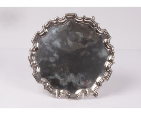 A silver salver, CA, London 1930, with pie crust edge, 26.5cm wide, approximately 538g   CONDITION REPORT:  Good condition, s
