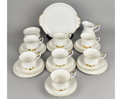 A Royal Albert Val D'or Tea Set to Comprise Seven Cups, Seven Saucers, Six Side Plates, Cake Plate, Sugar Bowl and a Milk Jug