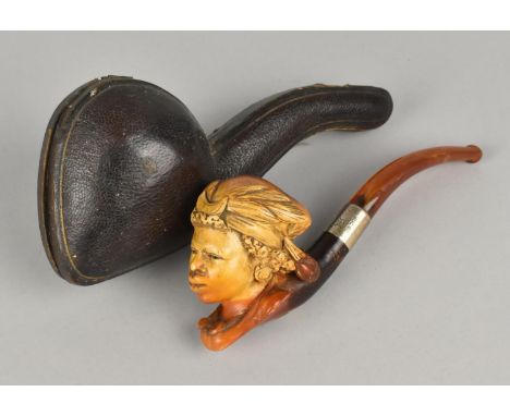 An Early 20th Century Cased Meerschaum Pipe, Carved Bowl in the Form of an African Maiden, with Silver Band and Amber Mouthpi