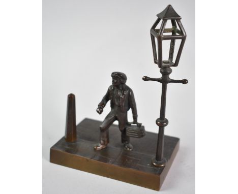 An Early 20th Century American Patinated Bronze Novelty Desktop Stand in the Form of a Shoeshine Boy beside Street Lamp, rect