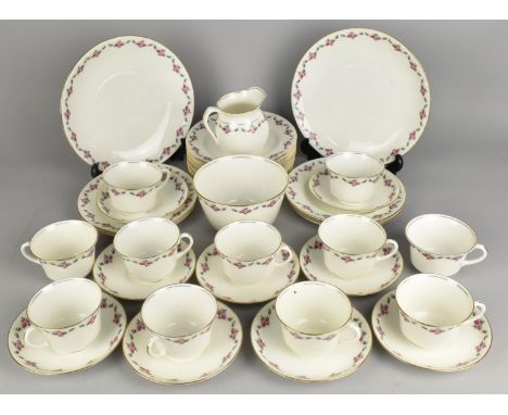 An Aynsley Floral Swag Decorated Tea Set to Comprise Eleven Cups, Nine Saucers, Twelve Side Plates, Two Cake Plates, Milk Jug