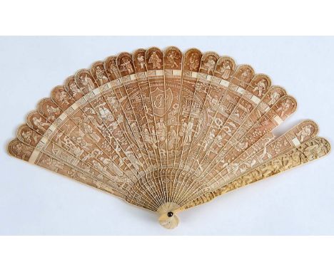 A CHINESE IVORY FAN Carved sticks and brise leaves carved with figures and buildings, 19th century;  19 cms