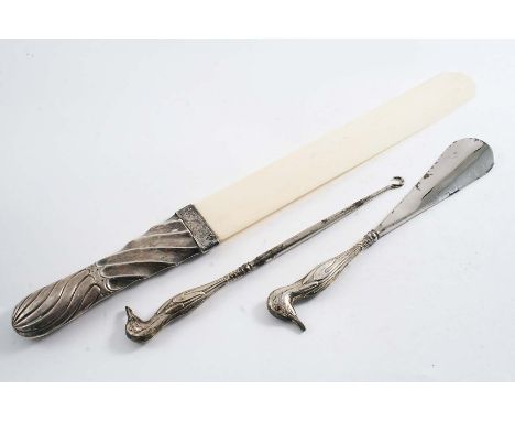 A LATE VICTORIAN MOUNTED IVORY PAGE TURNER OR PAPER KNIFE by E.S. Barnsley, Birmingham 1889 and an Edwardian mounted steel bu
