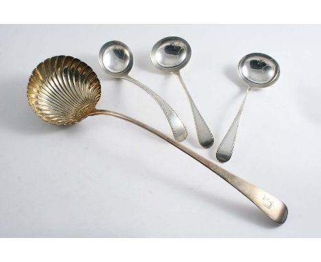A GEORGE  III SOUP LADLE with a fluted bowl, initialled "D" by Christopher & Thomas Barker, London 1802, a pair of George III