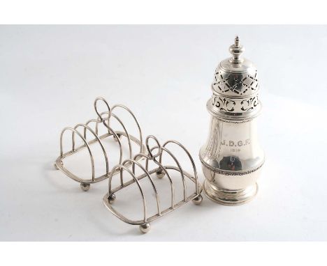 AN EARLY 20TH CENTURY SUGAR CASTER with a high-domed cover & knop finial, initialled "JDGF" and dated 1919 by J.C. Vickery, B