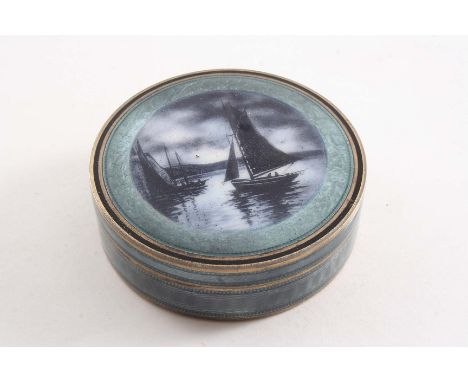 AN EARLY 20TH CENTURY FRENCH SILVERGILT & ENAMELLED CIRCULAR BOX with engine-turned base, the cover with small dinghies in a 