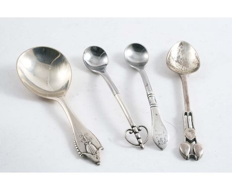 A DANISH AKKELEJE PATTERN CADDY SPOON by Georg Jensen, Copenhagen 1925, two mounted stainless steel condiment spoons by the s