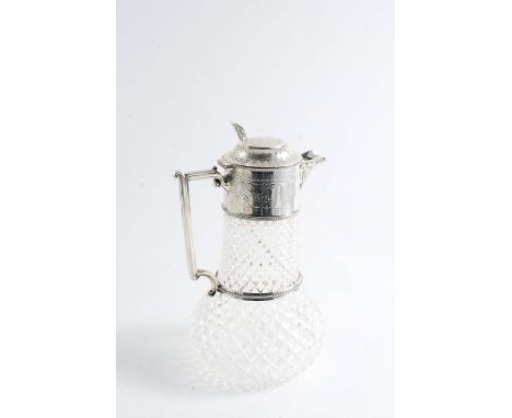 A LATE VICTORIAN MOUNTED CUT-GLASS CLARET JUG with an engraved mount, a pierced thumbpiece and a baluster hob-cut body, by Wi